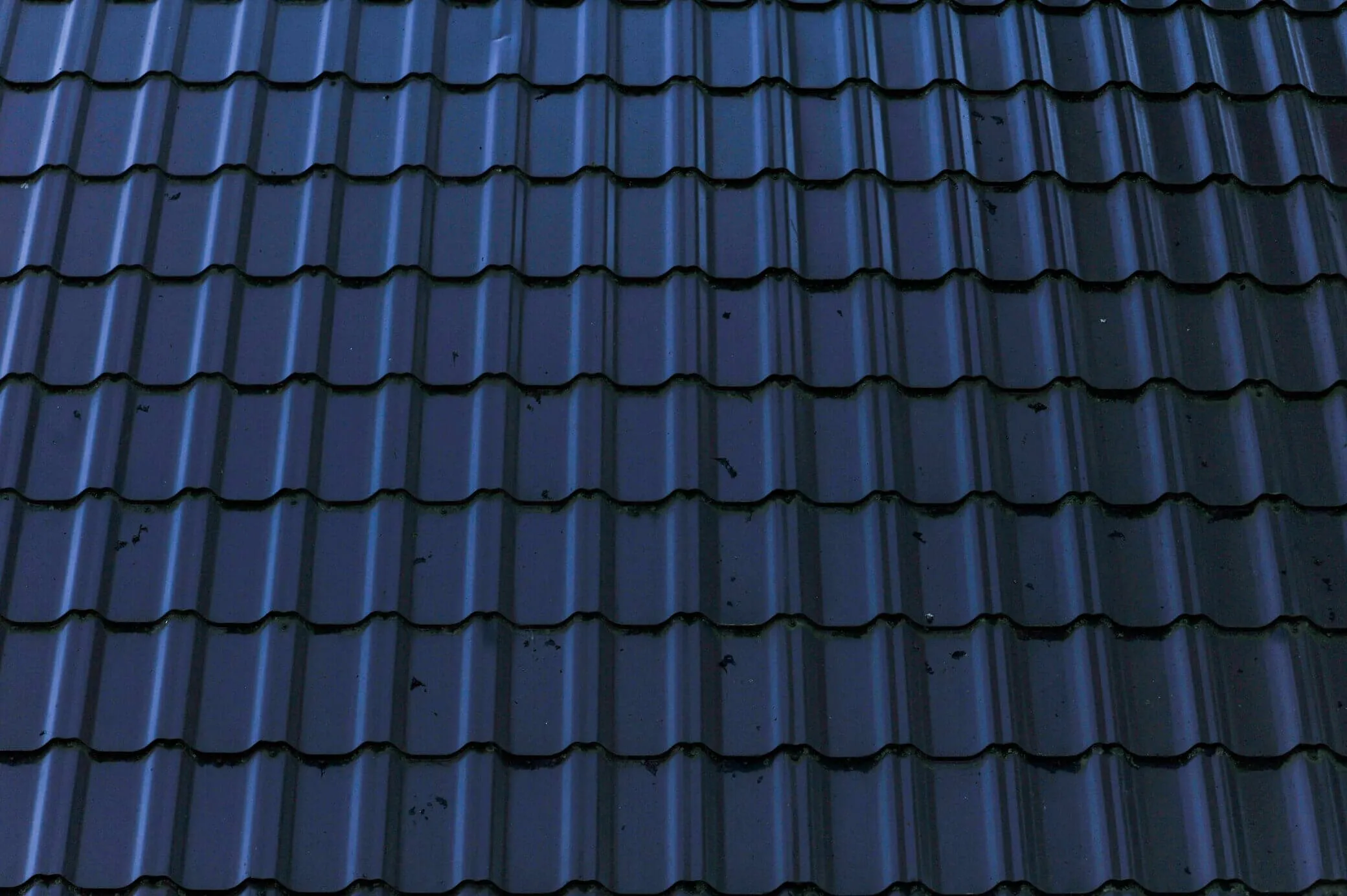 Close-up of blue metal roofing tiles